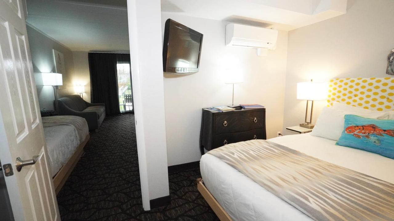 E-3 Kitchenette, One Bedroom with  One Queen Bed, One Single Bed, One Sofa Bed